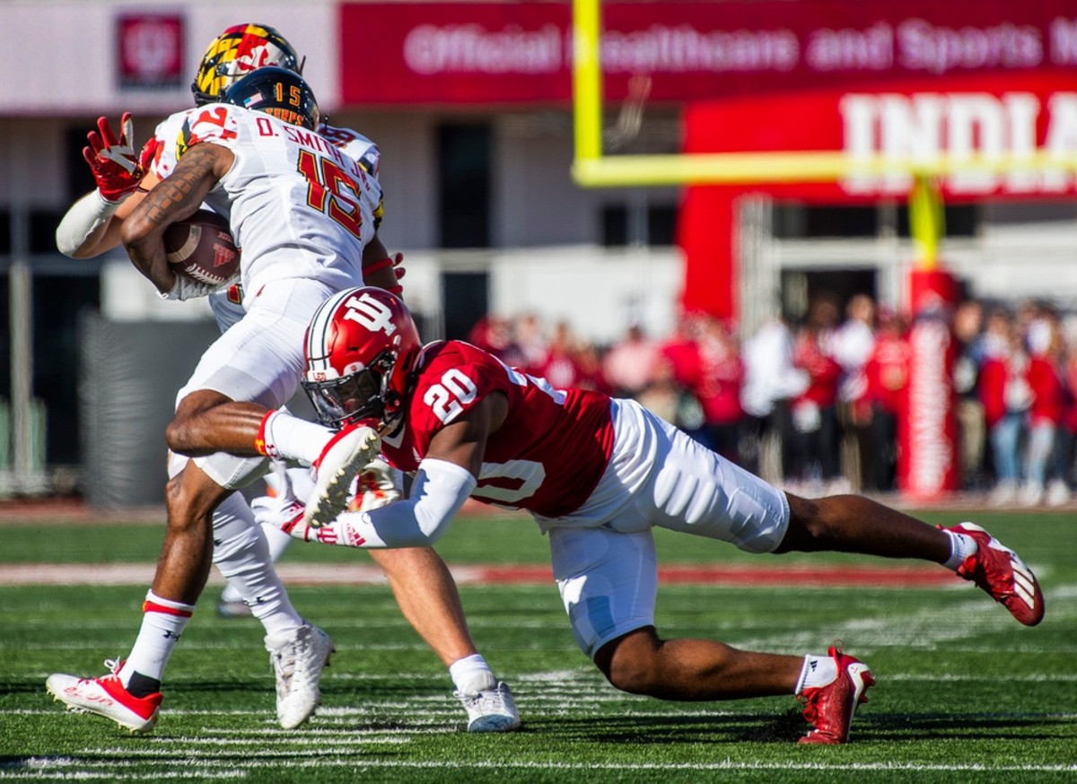 Indiana's Louis Moore (20) hits Maryland's Octavian Smith Jr. (15) during the Indiana versus Maryland football game at Memorial Stadium on Saturday, Oct. 15, 2022.