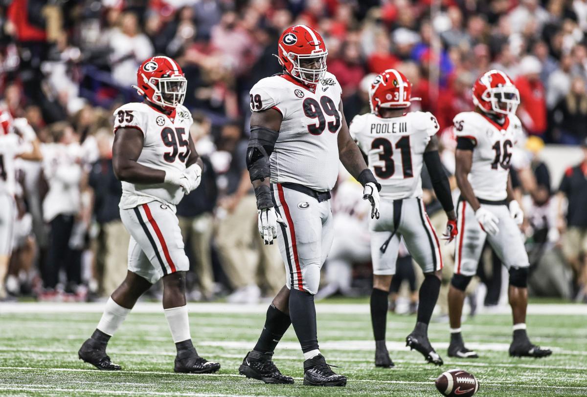 Jordan Davis and Devonte Wyatt during the College Football Playoff National Championship against Alabama (Photo by Mackenzie Miles)