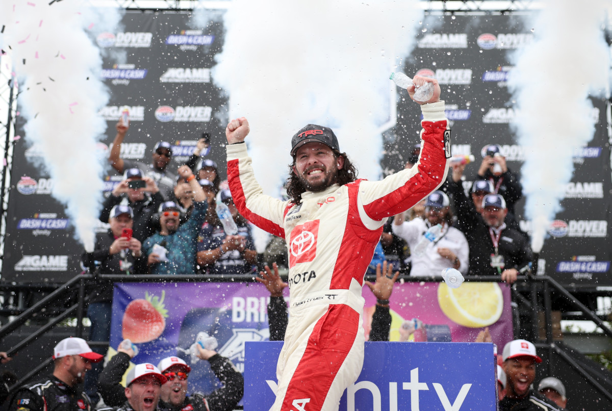 Ryan Truex celebrates in victory lane after winning Saturday's NASCAR Xfinity Series A-GAME 200 at Dover International Speedway. (Photo by James Gilbert/Getty Images)