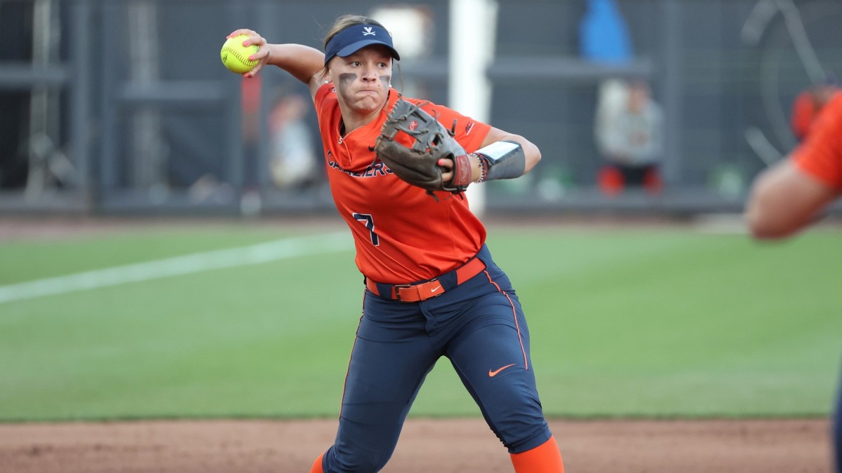 Sarah Coon throws to first base during the Virginia softball game against Louisville at Palmer Park.