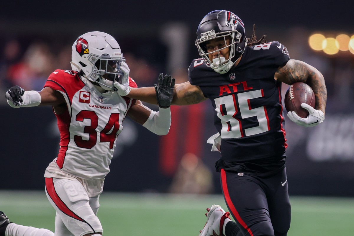 Jan 1, 2023; Atlanta Falcons tight end MyCole Pruitt (85) stiff arms Arizona Cardinals safety Jalen Thompson (34). Mandatory Credit: Brett Davis-USA TODAY