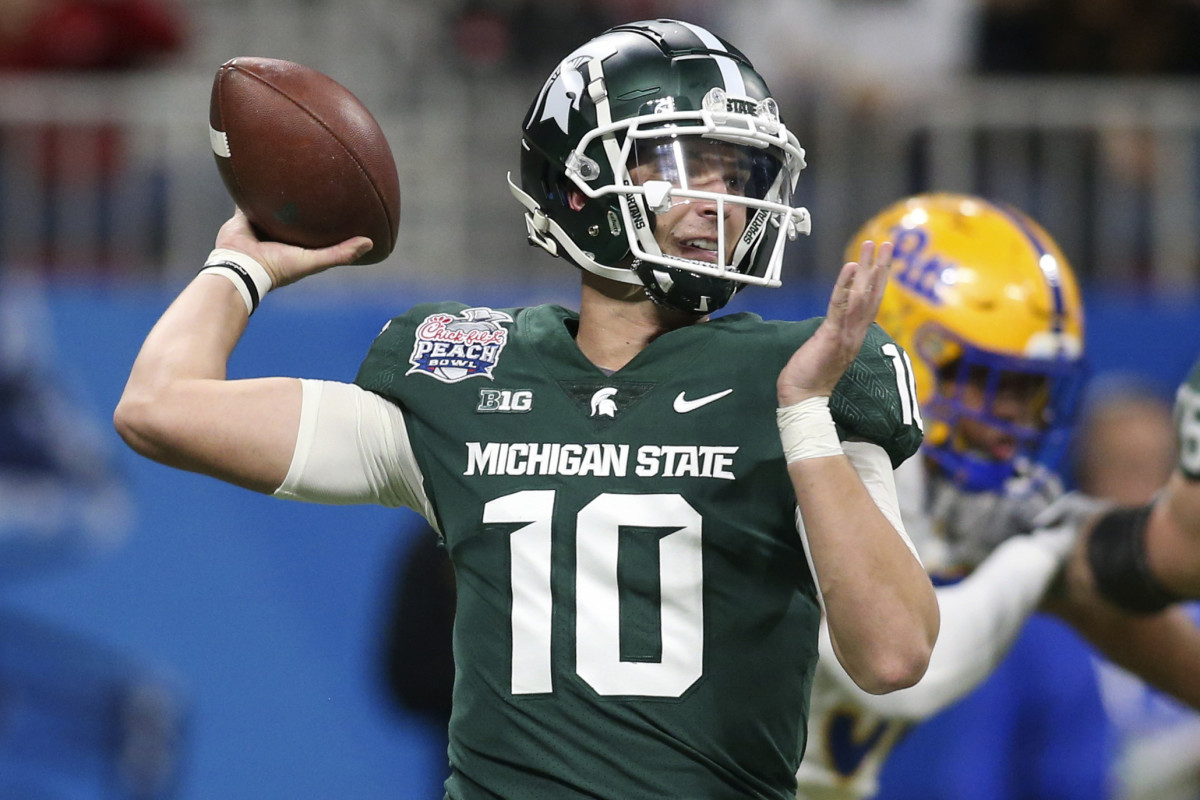 Dec 30, 2021; Atlanta, GA, USA; Michigan State Spartans quarterback Payton Thorne (10) throws a pass against the Pittsburgh Panthers in the first quarter during the 2021 Peach Bowl at Mercedes-Benz Stadium. Mandatory Credit: Brett Davis-USA TODAY Sports