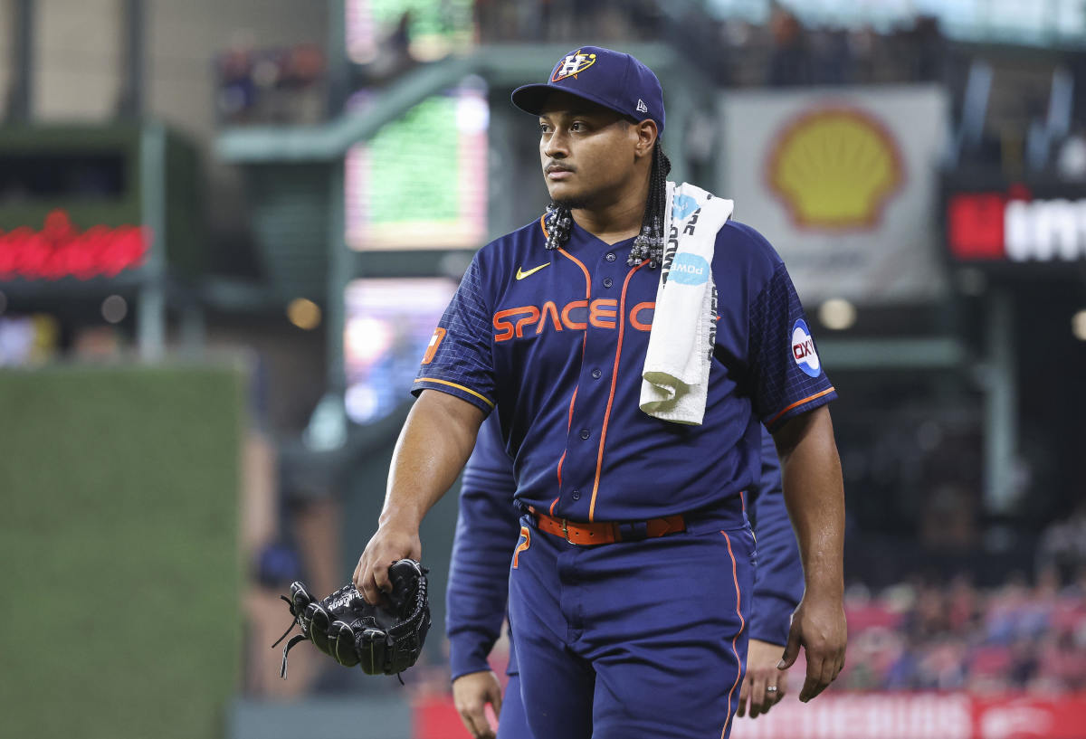Astros' Luis Garcia exits start with right elbow discomfort, placed on