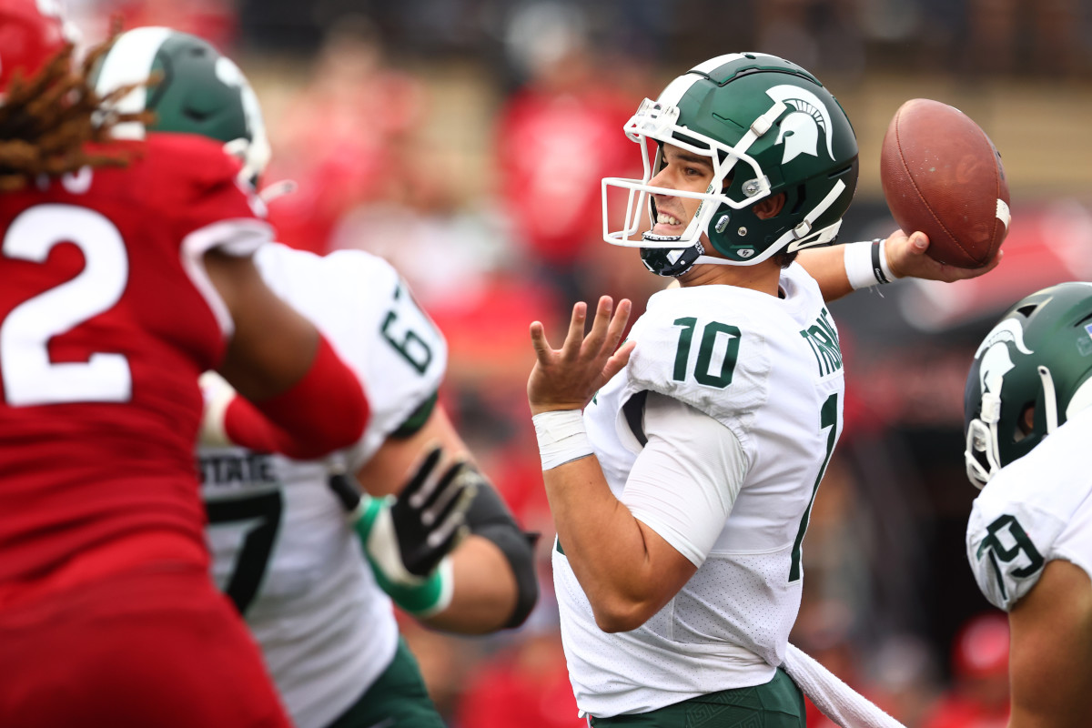 PISCATAWAY, NJ - OCTOBER 09 : Quarterback Payton Thorne #10 of the Michigan State Spartans attempts a pass during the third quarter of a game against the Rutgers Scarlet Knights at SHI Stadium on October 9, 2021 in Piscataway, New Jersey. Michigan State defeated Rutgers 31-13. (Photo by Rich Schultz/Getty Images)