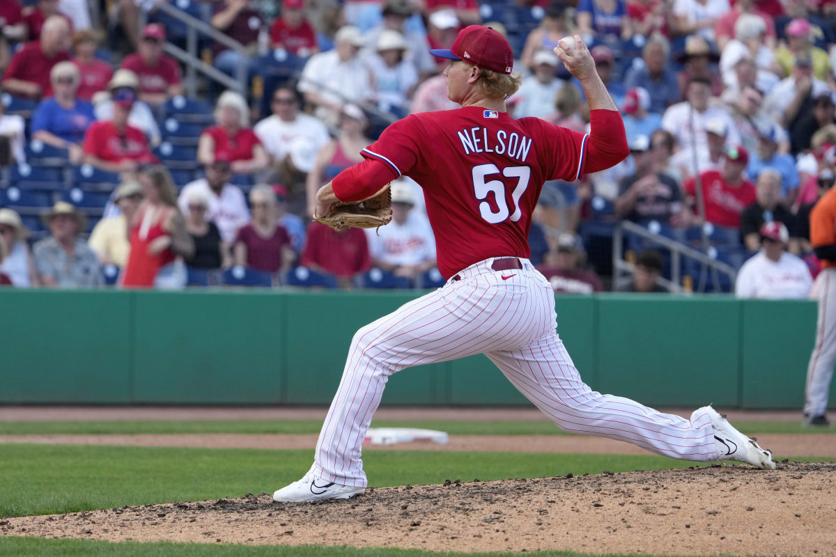 Phillies make flurry of roster moves as Lee returns