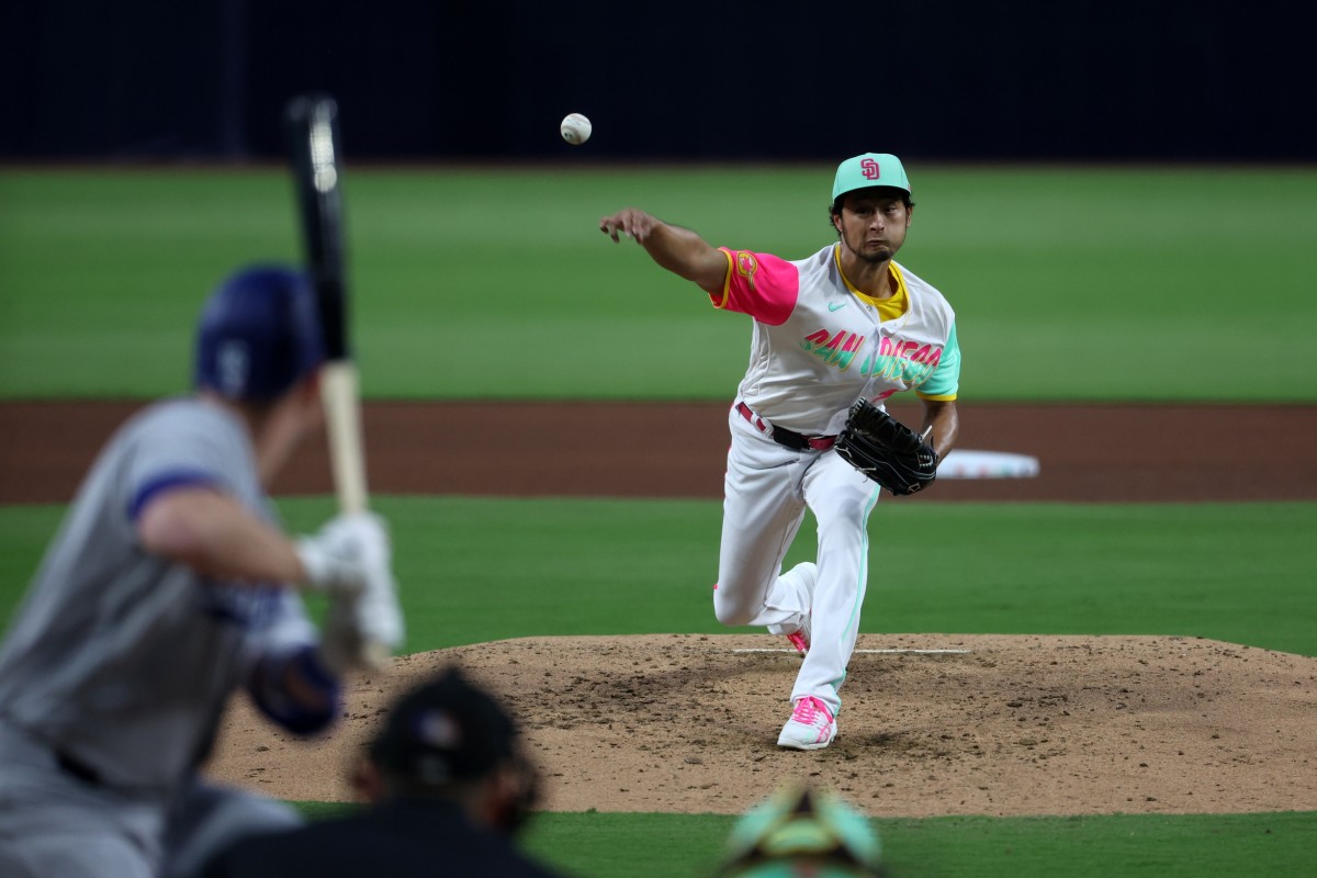 Juan Soto of the San Diego Padres laughs as he is booed while he is