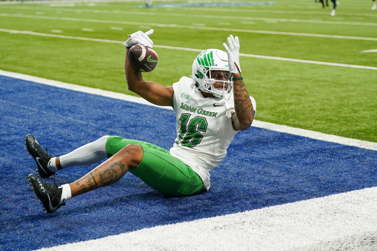 Dec 2, 2022; San Antonio, Texas, USA; North Texas Mean Green wide receiver Jyaire Shorter (16) celebrates a touchdown catch in the second half against the UTSA Roadrunners at the Alamodome. Mandatory Credit: Daniel Dunn-USA TODAY Sports