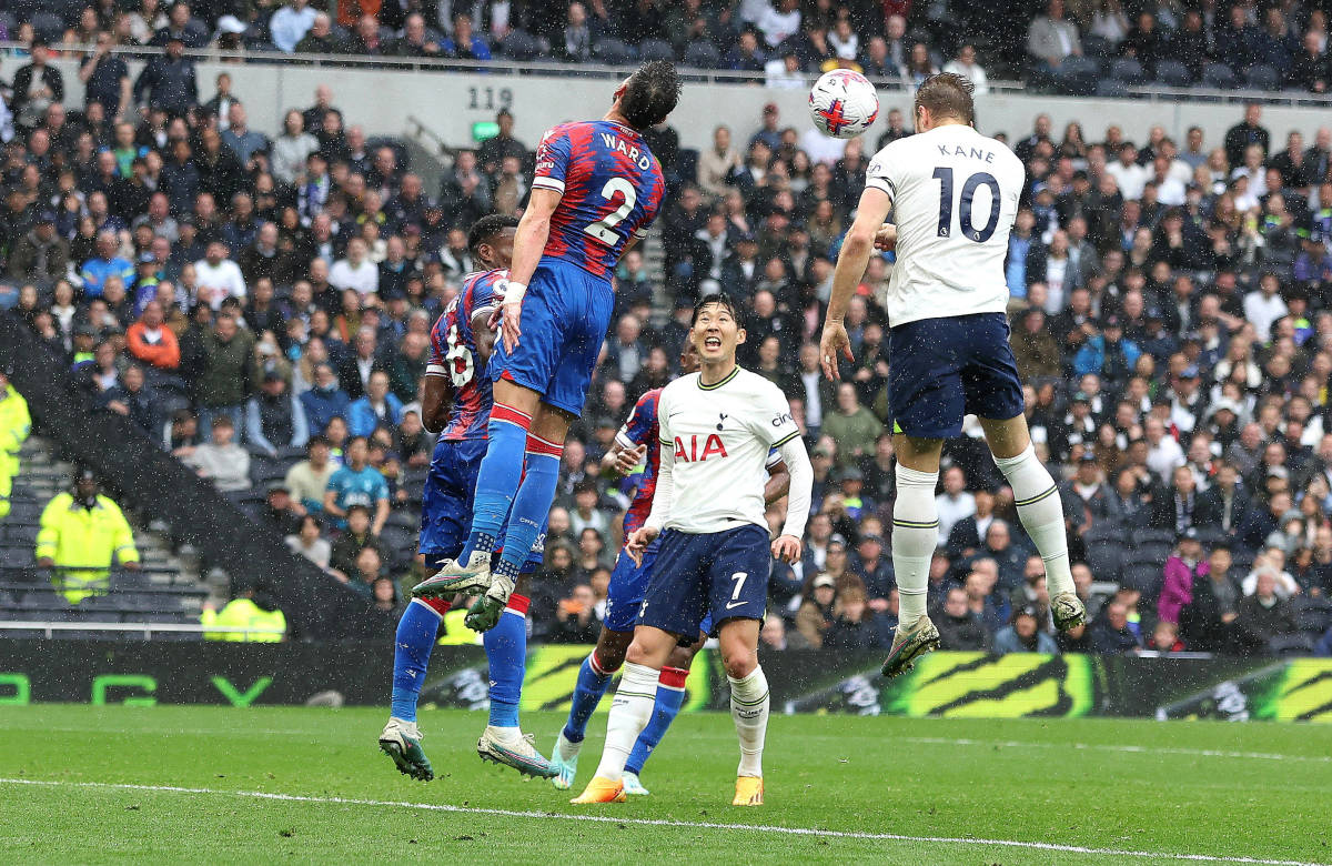 Harry Kane pictured (right) heading the ball to score for Tottenham against Crystal Palace in May 2023