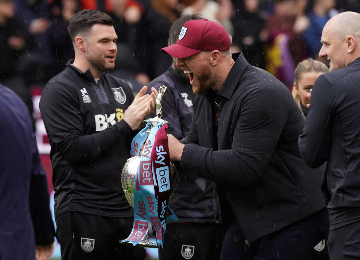 JJ Watt pictured holding the EFL Championship trophy after Burnley ended the 2022/23 season on 101 points