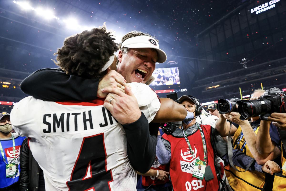 Kirby Smart and Nolan Smith after the 2022 College Football Playoff National Championship against Alabama