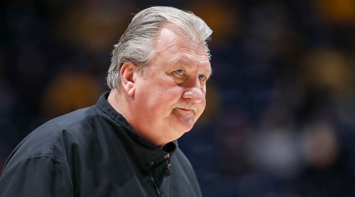 West Virginia Mountaineers head coach Bob Huggins walks into the locker room at halftime during a game.