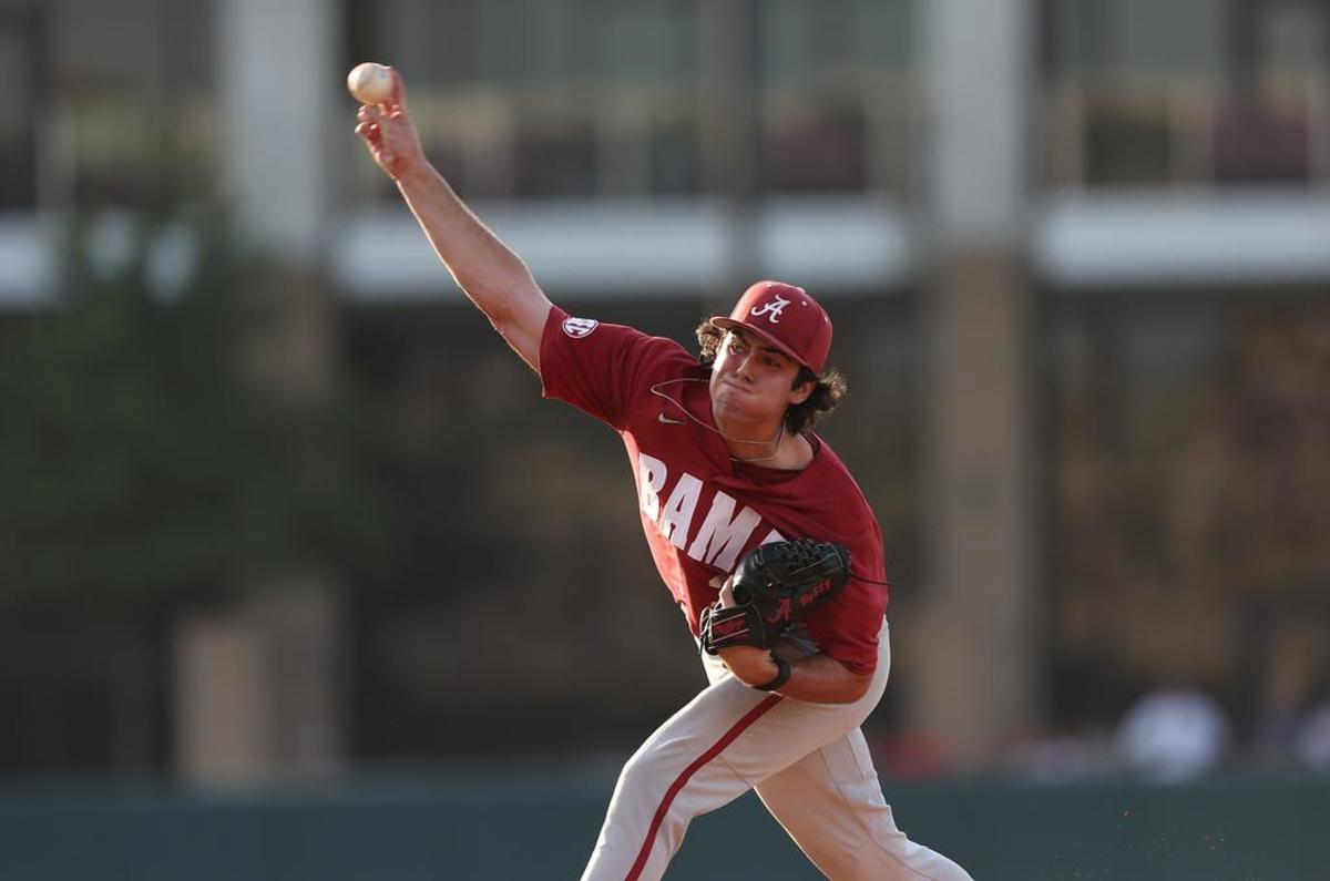 Alabama’s Luke Holman (35) pitches the ball against Texas A&M at Blue Bell Park in College Station, Texas on Friday, May 12, 2023.