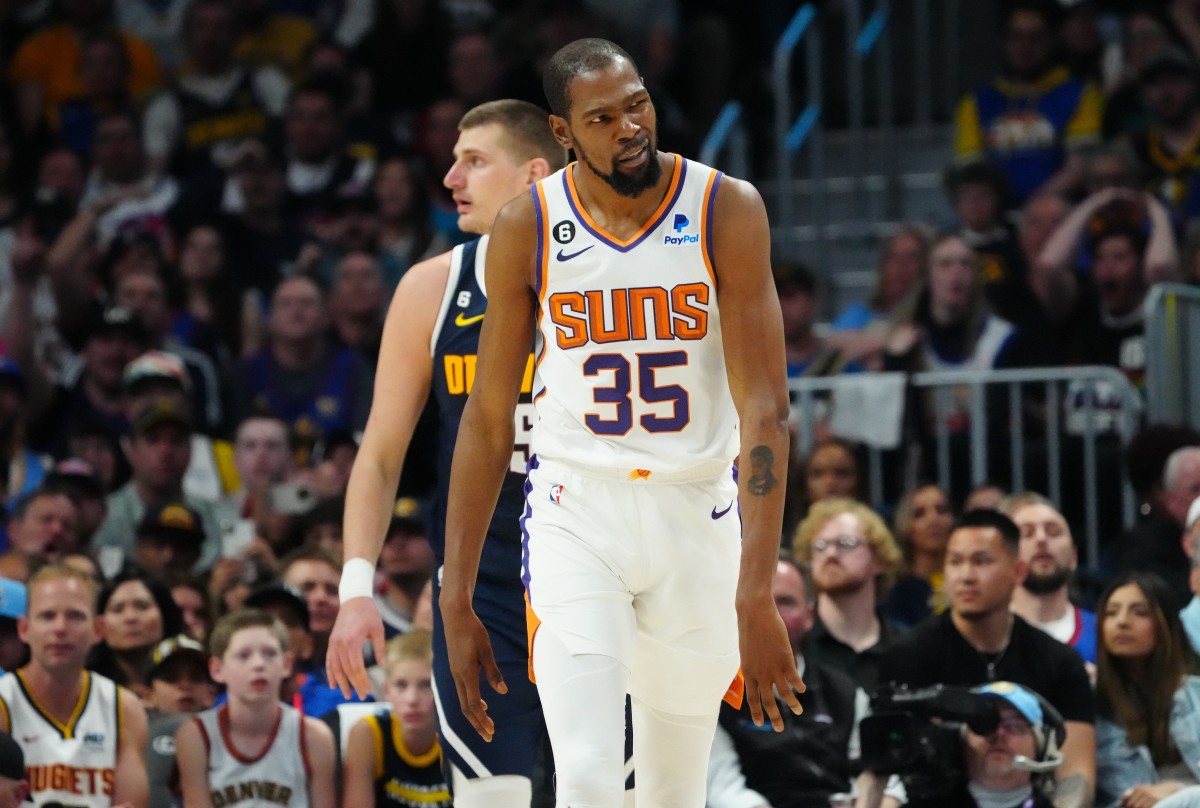 Nuggets dig in, ruin Durant's debut