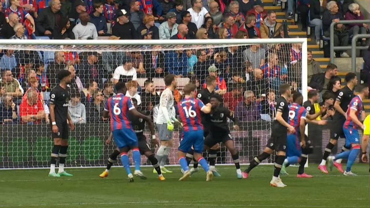 Crystal Palace defender Joachim Andersen (no.16) pictured striking Bournemouth midfielder Jefferson Lerma in the face with a clenched fist during a Premier League game in May 2023