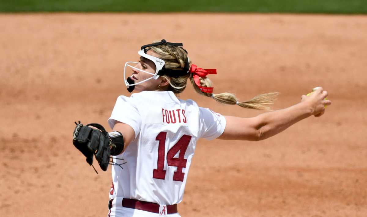 Alabama pitcher Montana Fouts (14) delivers a pitch against Auburn in Rhoads Stadium Sunday in the final game of the series April 23, 2023.