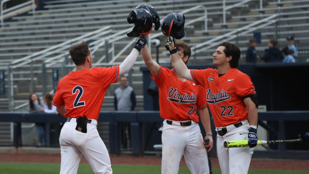 Ethan O'Donnell celebrates with Colin Tuft and Jake Gelof at home plate after hitting a home run during the Virginia baseball game against Georgia Tech at Mac Nease Baseball Park.