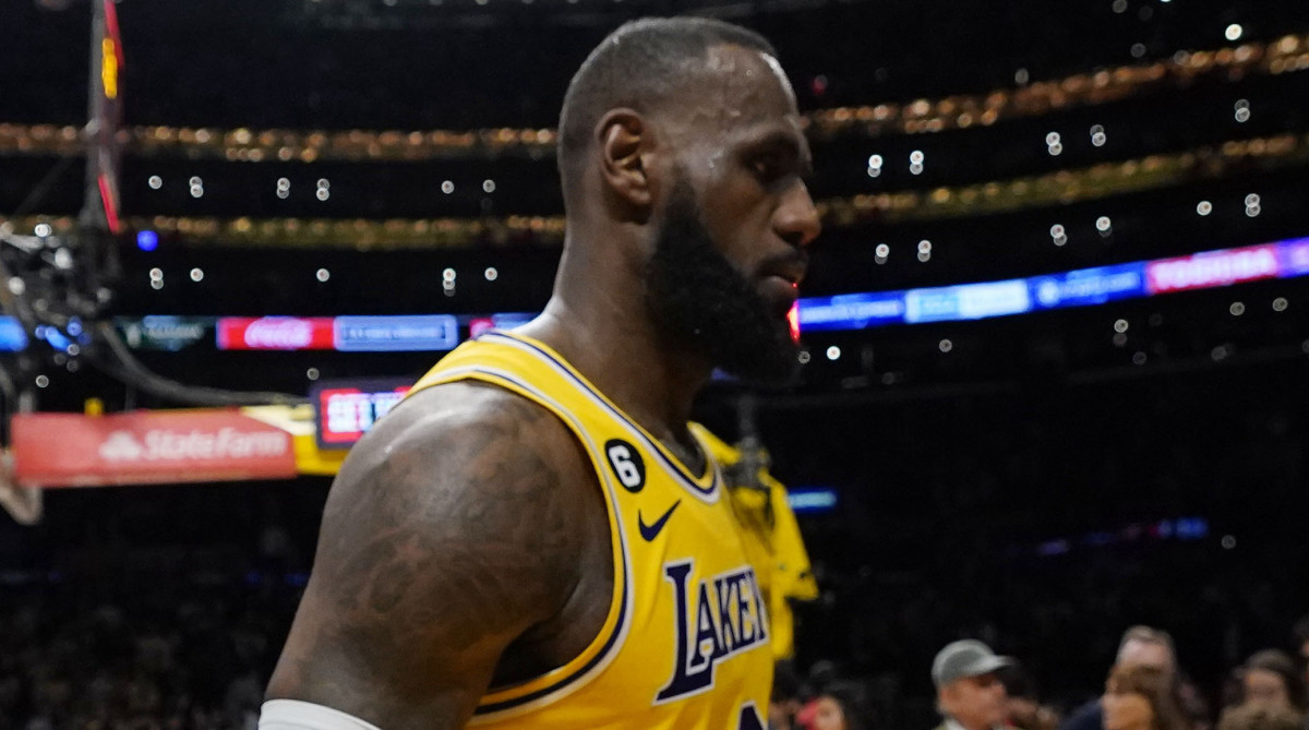 Lakers forward LeBron James walks off the court after Game 4 loss to Nuggets