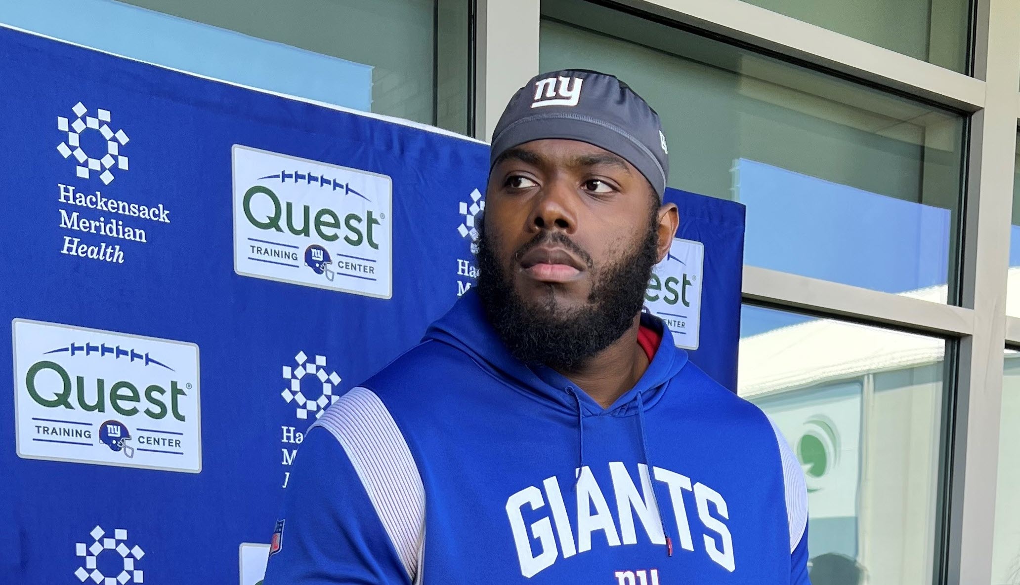 Andrew Thomas of the New York Giants reacts as he walks off the