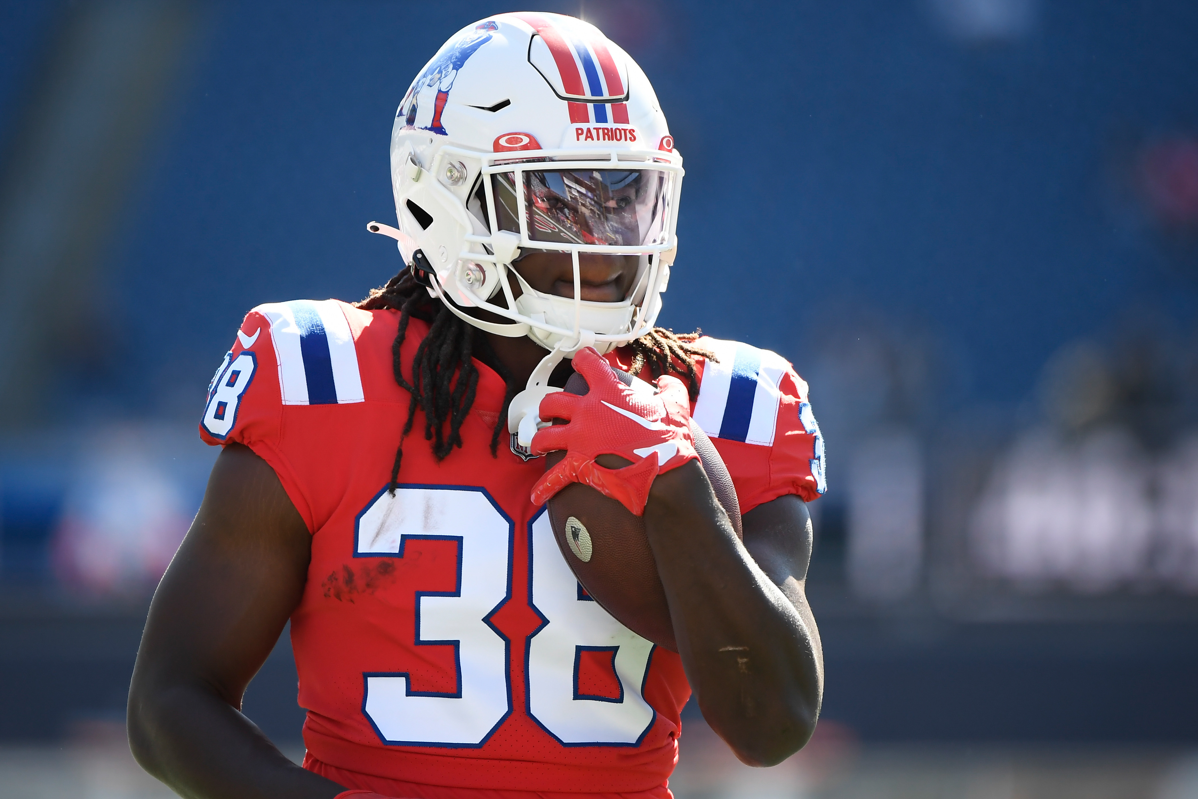 New England Patriots running back Rhamondre Stevenson (38) warms