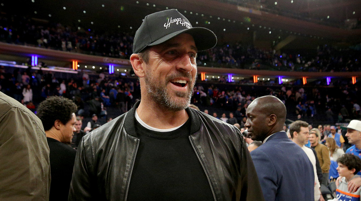 Jets quarterback Aaron Rodgers walks off the court after Game 1 of the 2023 NBA Eastern Conference semifinal between the New York Knicks and the Heat at Madison Square Garden.