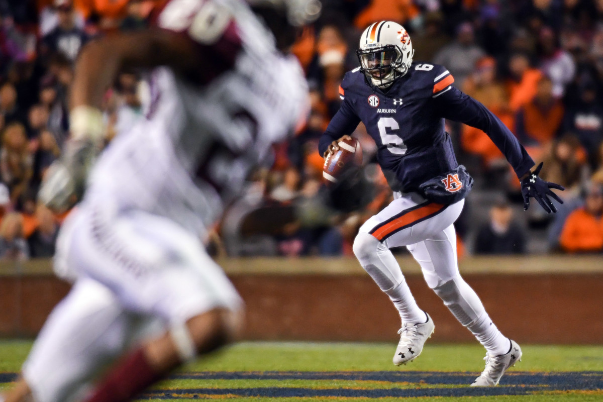 Nov 19, 2016; Auburn, AL, USA; Auburn Tigers quarterback Jeremy Johnson (6) runs the ball against the Alabama A&M Bulldogs during the second quarter at Jordan Hare Stadium. Mandatory Credit: Shanna Lockwood-USA TODAY Sports