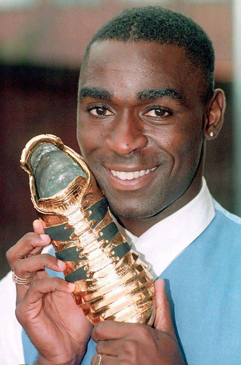 Andy Cole pictured holding the Golden Boot award in 1994 after scoring 34 goals for Newcastle in his first ever EPL season