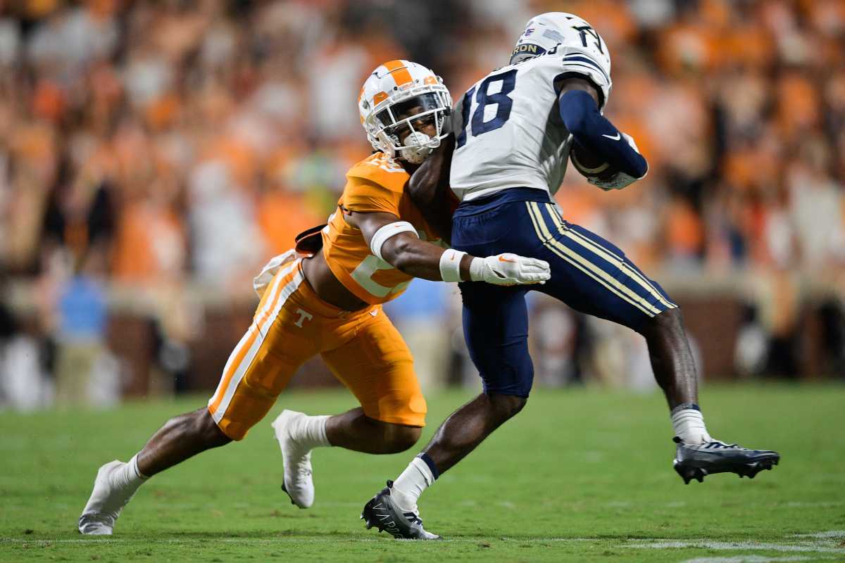 Tennessee defensive back Christian Harrison (29) tackled Akron wide receiver Shocky Jacques-Louis (18) during a game between Tennessee and Akron at Neyland Stadium in Knoxville, Tenn. on Saturday, Sept. 17, 2022.