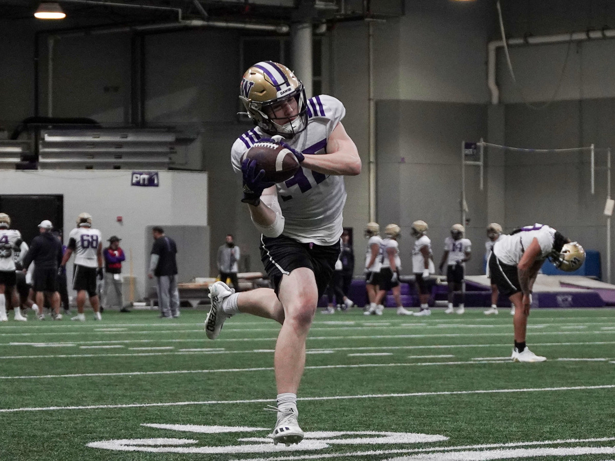 Sean Toomey-Stout runs through an interception drill.