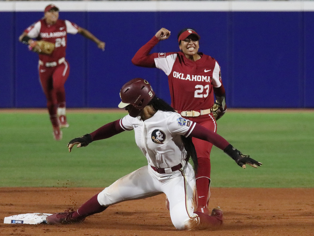 Tiare Jennings celebrates after a double play.