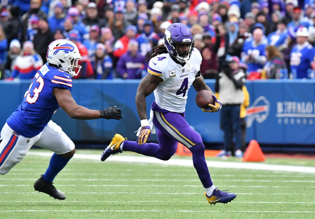 Minnesota Vikings running back Dalvin Cook (4) outruns Buffalo Bills linebacker Tyrel Dodson (53). Mandatory Credit: Mark Konezny-USA TODAY Sports