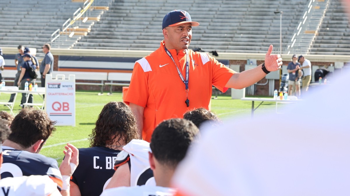 Virginia Cavaliers football head coach Tony Elliott speaks to his players following the conclusion of the Virginia football spring game at Scott Stadium.