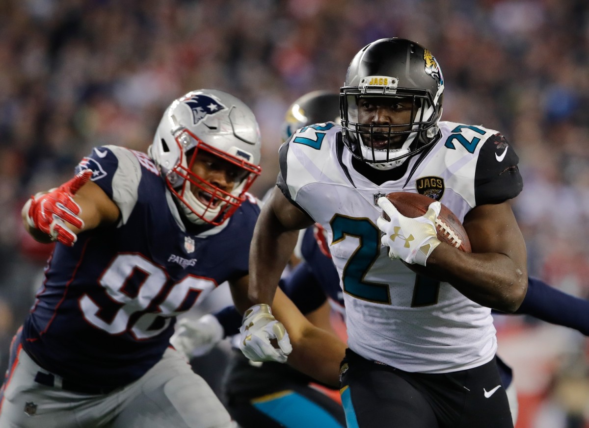 Jacksonville Jaguars running back Leonard Fournettte (27) celebrates 4-yard  touchdown run against the New England Patriots in the second quarter of the  AFC Championship game at Gillette Stadium in Foxborough, Massachusetts on