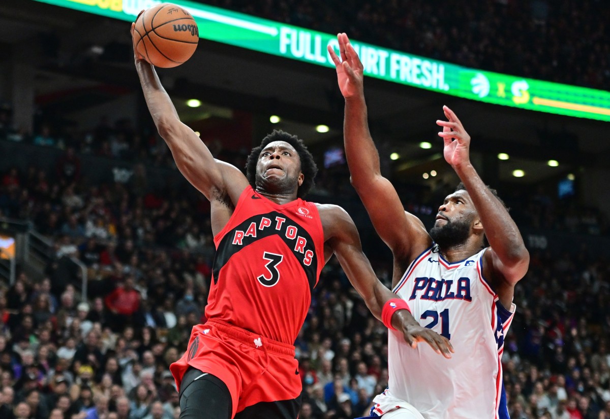 Toronto Raptors forward OG Anunoby (3) goes to the basket past Philadelphia 76ers center Joel Embiid (21) in the second half at Scotiabank Arena.