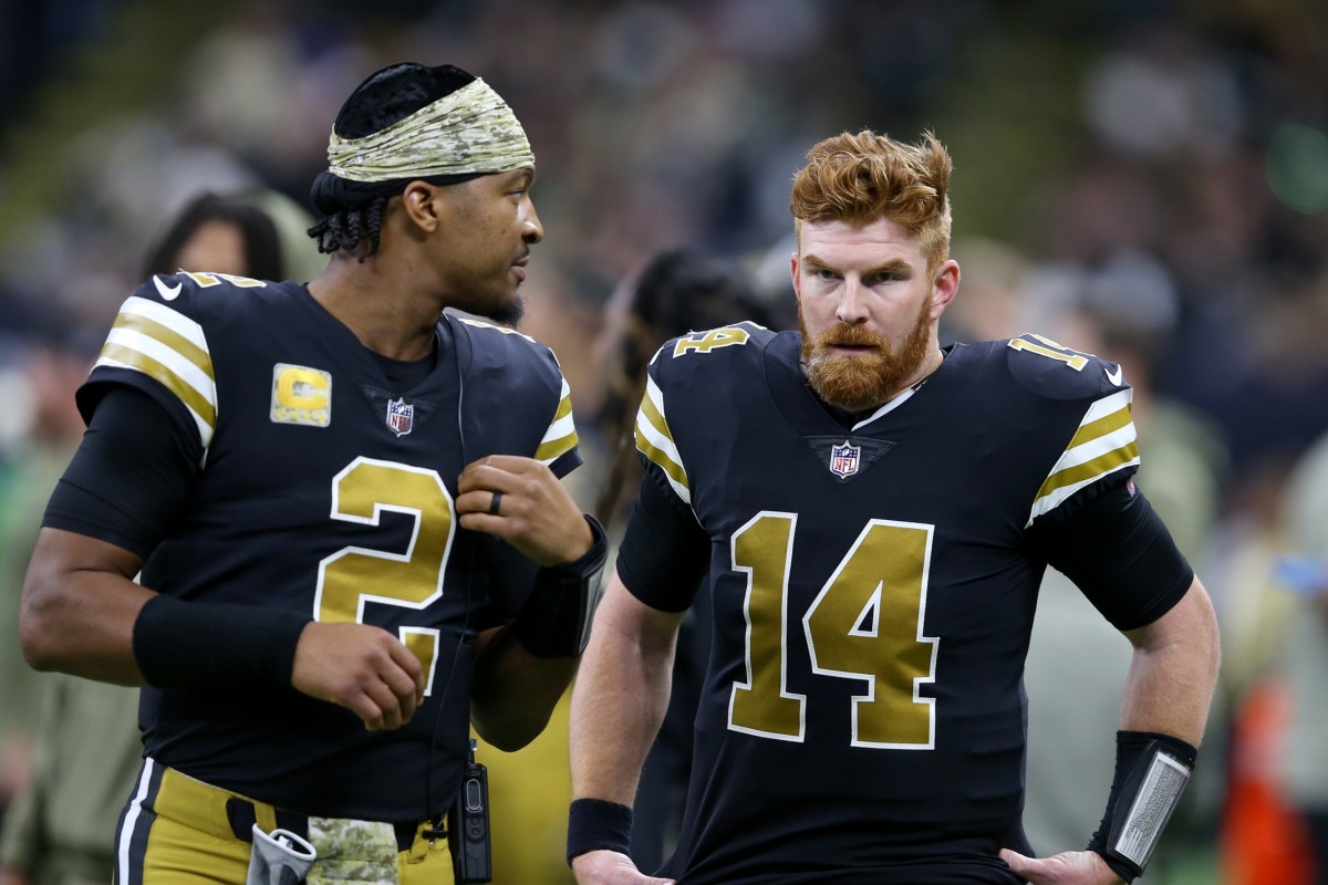 Nov 20, 2022; New Orleans Saints quarterbacks Jameis Winston (2) and Andy Dalton (14) talk in the second half against the Los Angeles Rams. Mandatory Credit: Chuck Cook-USA TODAY Sports