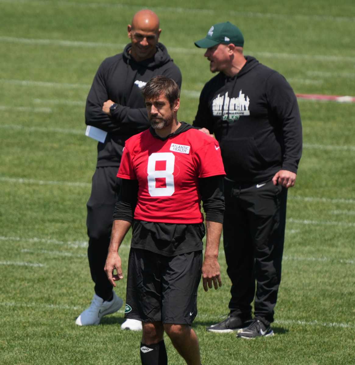 QB Aaron Rodgers (8) at OTAs with Robert Saleh and Nathaniel Hackett looking on