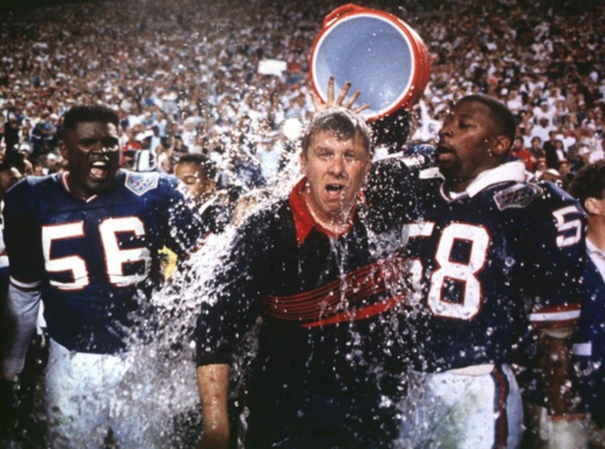 Giants head coach Bill Parcells gets doused with Gatorade with linebackers Lawrence Taylor, left, and Carl Banks, right, after the 20-19 win over the Bills in Superbowl XXV in Tampa, Fla. on Jan. 27, 1991.