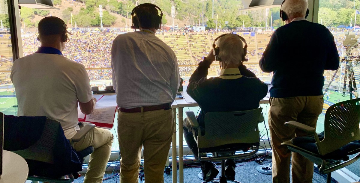 Joe Starkey, second from right, during his final Cal broadcast.