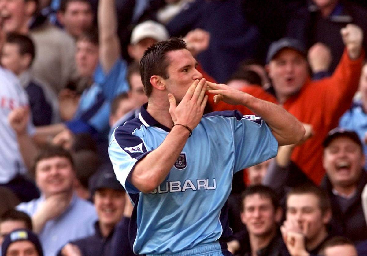 Cedric Roussel pictured celebrating after scoring a goal for Coventry City in a Premier League game against Bradford in March 2000
