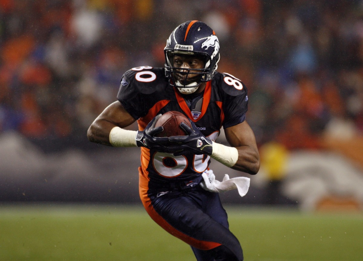 Denver Broncos wide receiver (80) Rod Smith makes a 9-yard reception in the fourth quarter against the Baltimore Ravens at Invesco Field at Mile High.