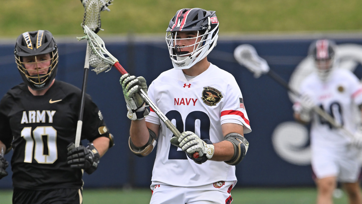 Navy faceoff specialist Anthony Ghobriel cradles the ball during a game against Army.