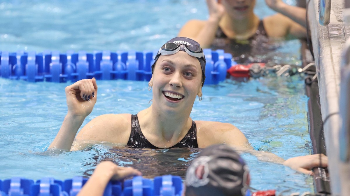 Gretchen Walsh celebrates after winning an NCAA title at the 2023 NCAA Women's Swimming & Diving Championships in Knoxville, Tennessee.