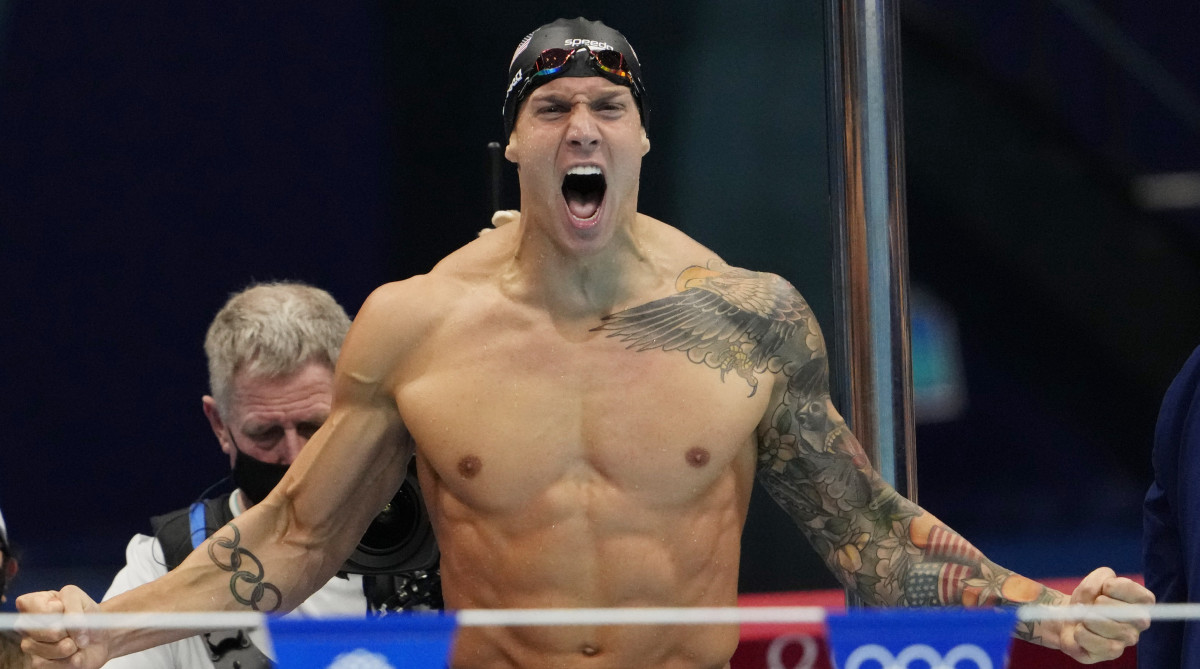 Caeleb Dressel celebrates after winning the men's 4x100m medley final during the Tokyo Olympics.