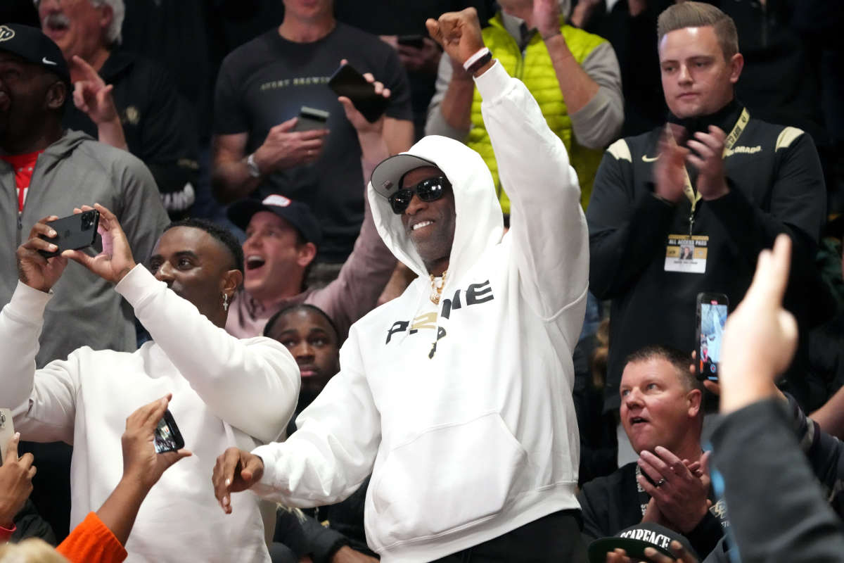 Colorado Buffaloes head coach Deion Sanders cheers during the game Colorado State Rams the second half at the CU Events Center.