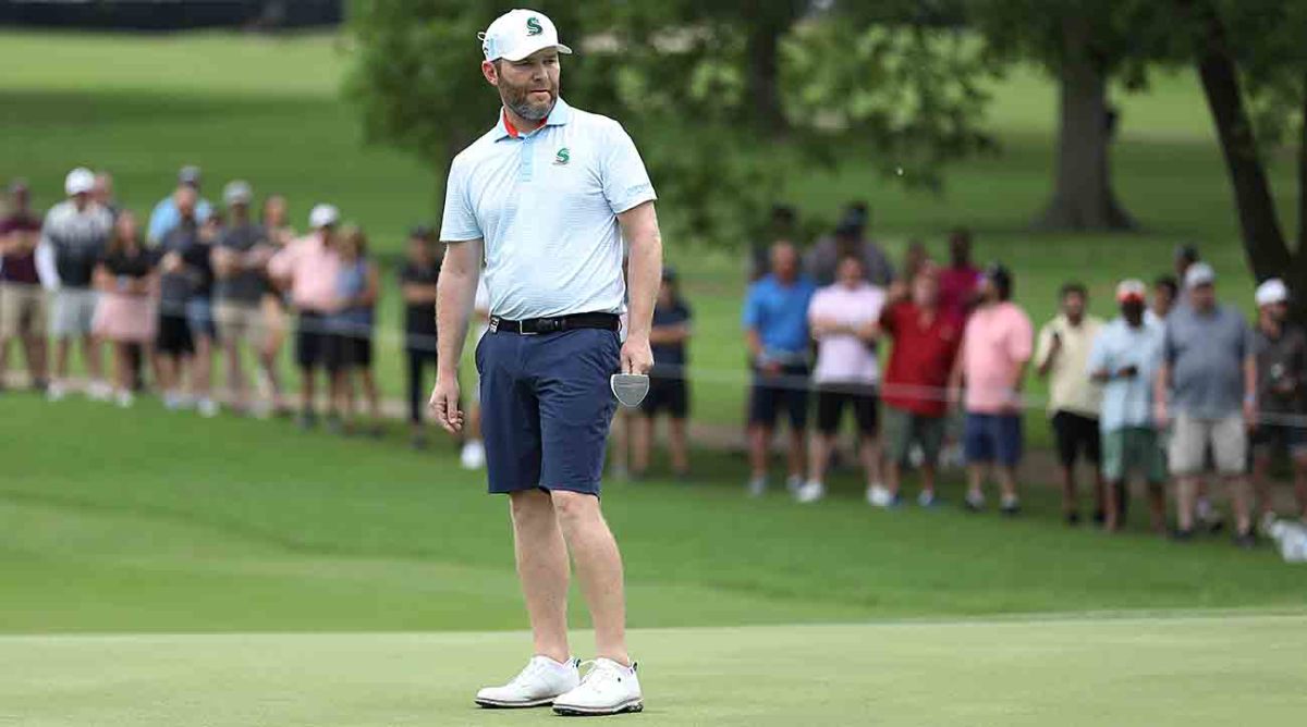 Branden Grace watches a putt at the 2023 LIV Golf Tulsa event.