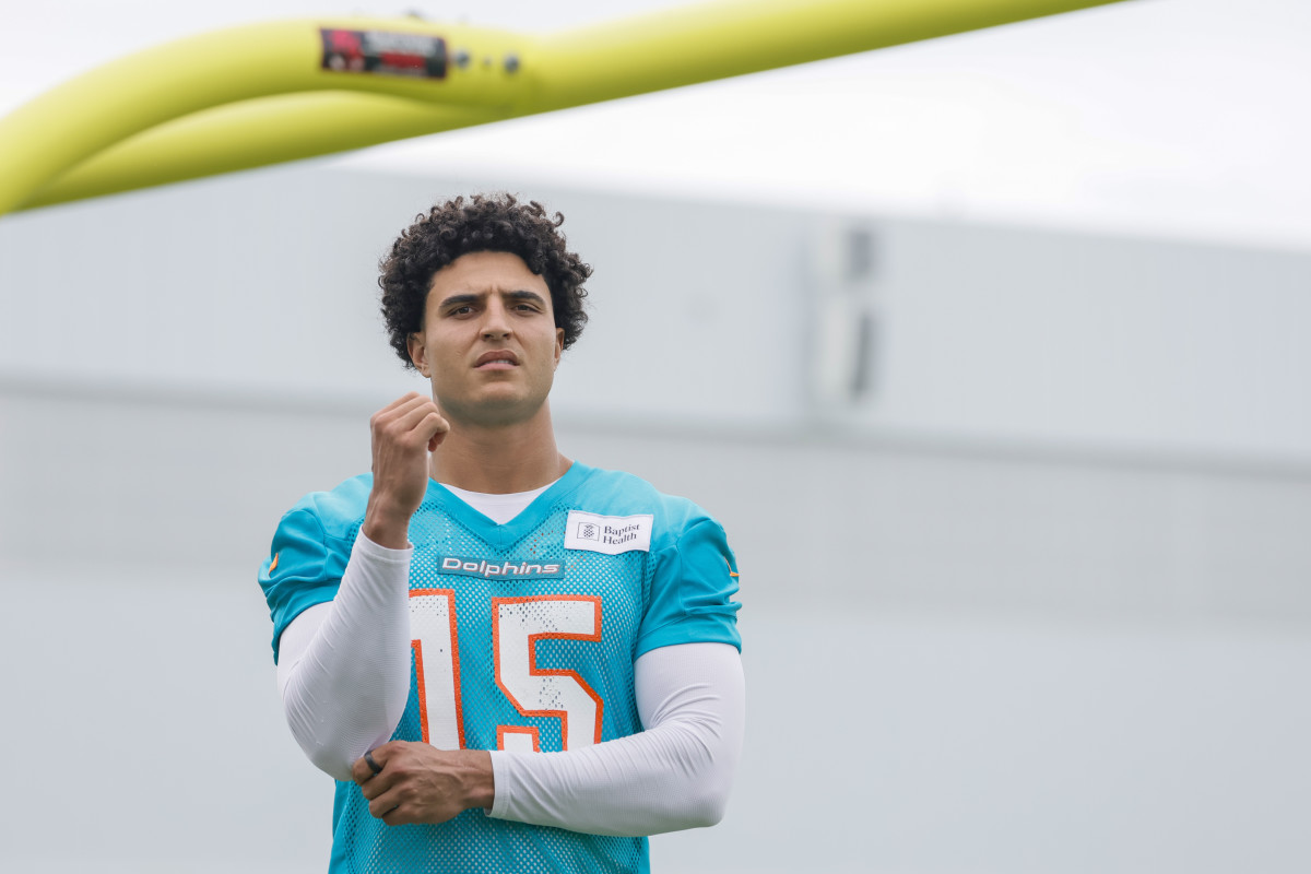 Miami Dolphins linebacker Jaelan Phillips looks on with his helmet off