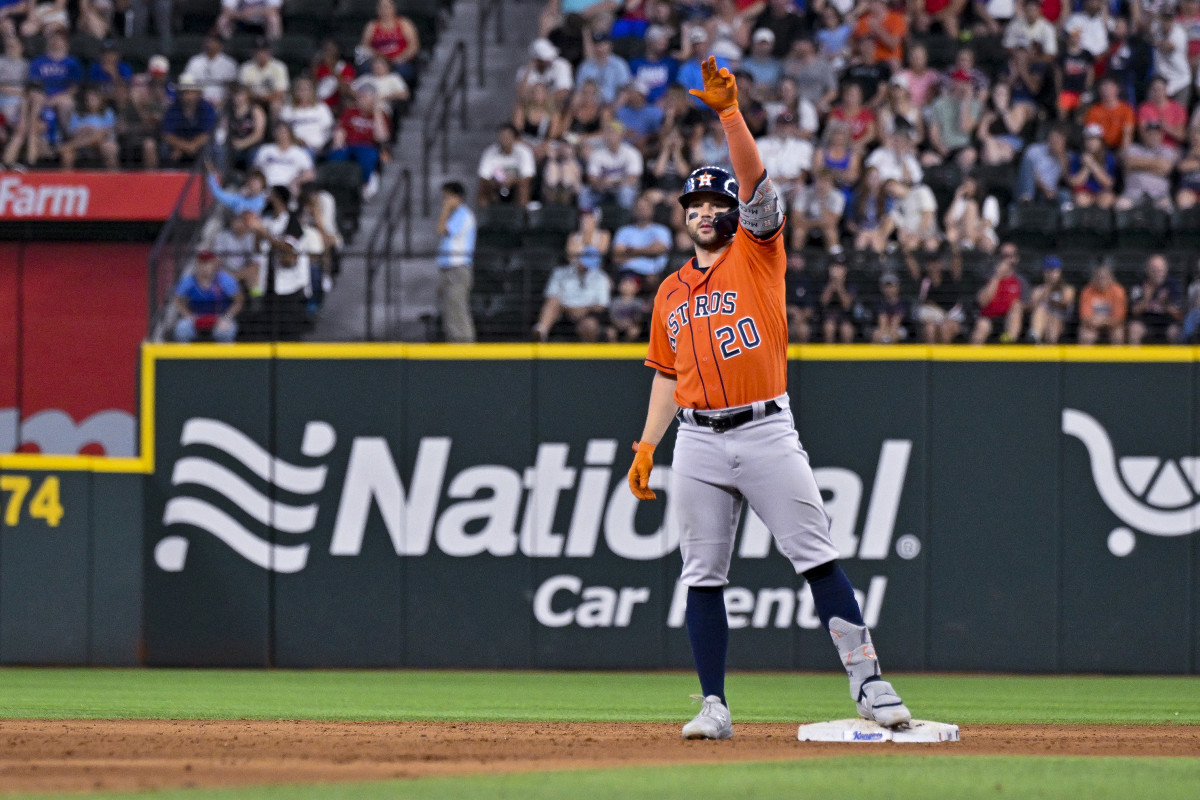 Jul 3, 2023; Arlington, Texas, USA; Houston Astros center fielder Chas McCormick (20) celebrates from second base after hitting a double and driving in the go ahead run against the Texas Rangers during the ninth inning at Globe Life Field. Mandatory Credit: Jerome Miron-USA TODAY Sports