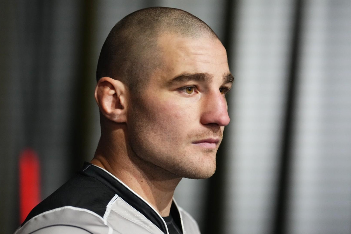 UFC middleweight Sean Strickland looks on.