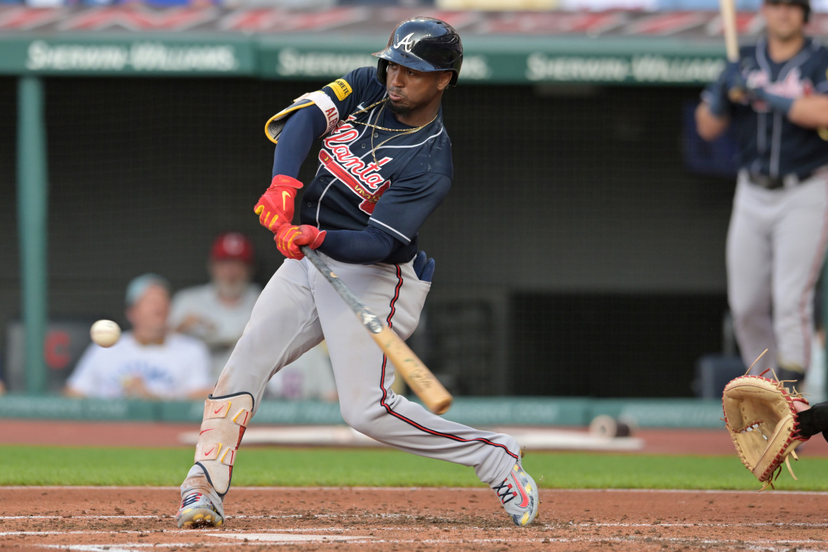 Jul 3, 2023; Cleveland, Ohio, USA; Atlanta Braves second baseman Ozzie Albies (1) hits an RBI single during the third inning against the Cleveland Guardians at Progressive Field.