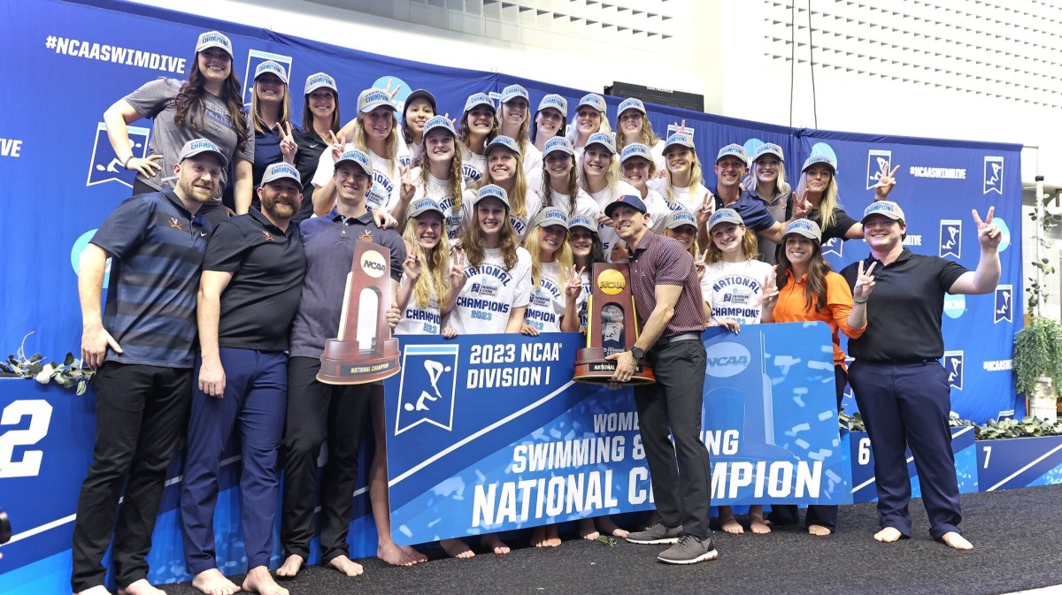 The Virginia women's swimming & diving team celebrates winning the 2023 NCAA Swimming & Diving National Championship.