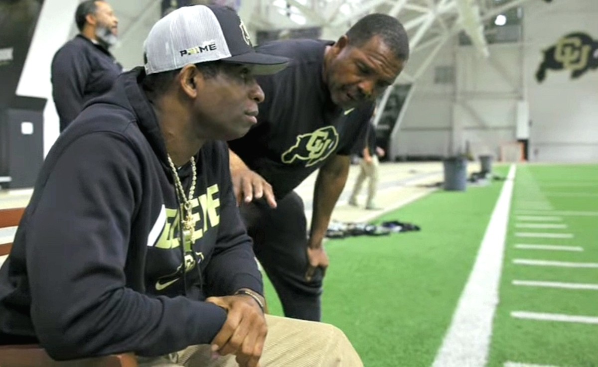 Deion Sanders watches practice at the University of Colorado